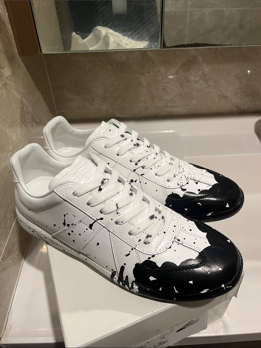 Maison Martin Margiela White Sneakers with Black Paint-Splash